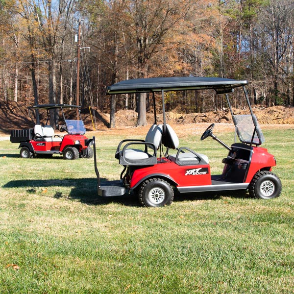two golf carts on golf course